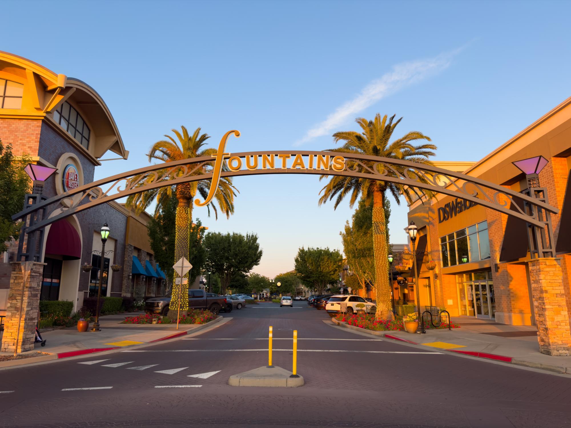The Fountains shopping district entrance at sunset in Roseville, California